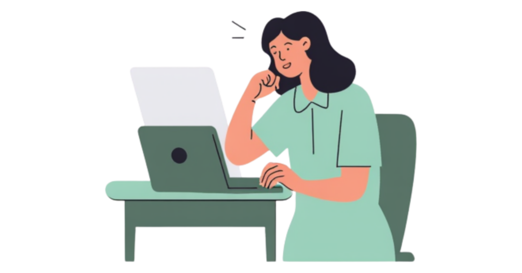 Woman sitting at desk on laptop